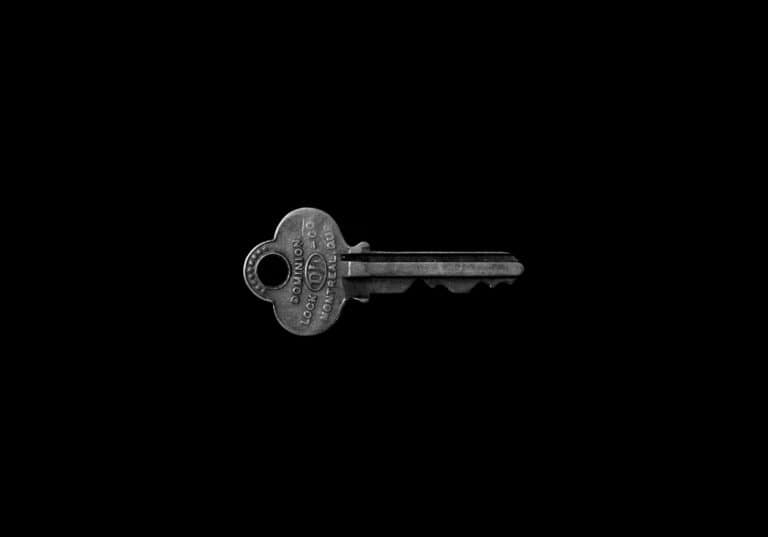 house key on a black background